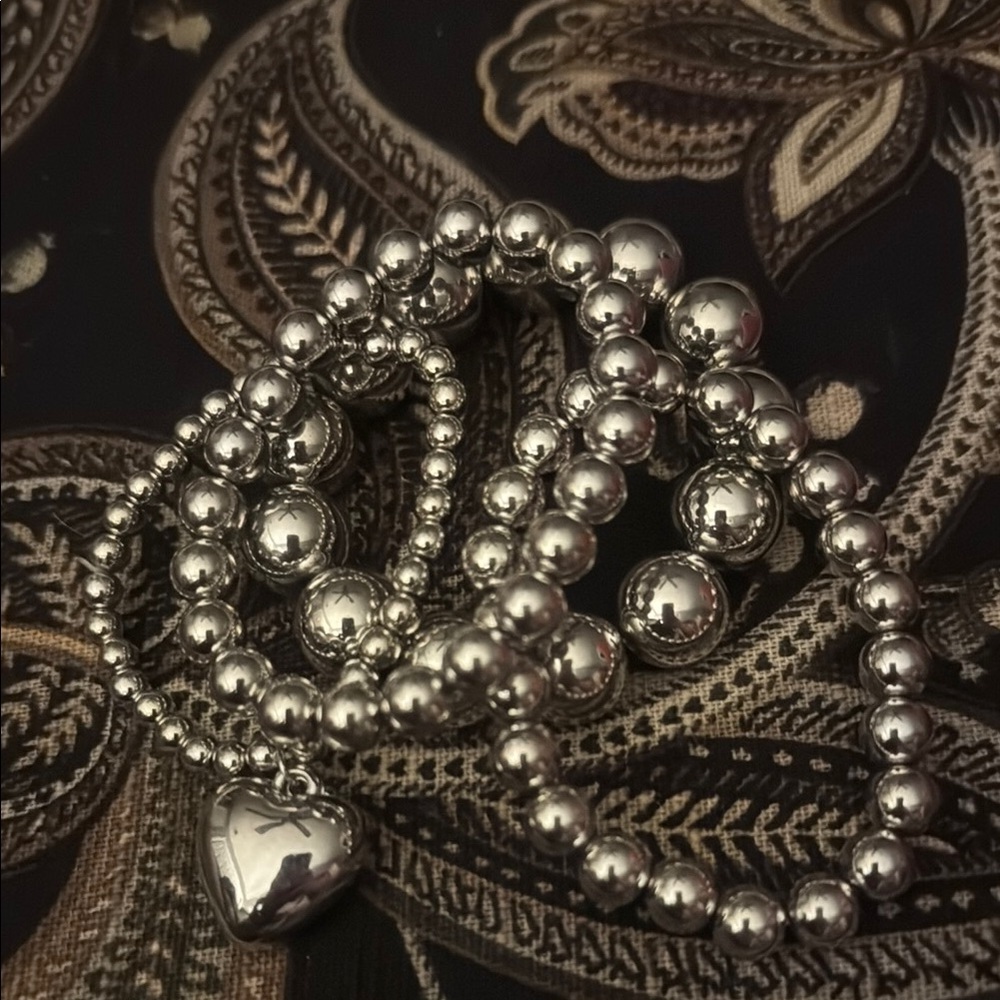 Silver Beaded Bracelet with Heart Charm need to have a small wrist